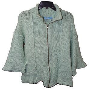 Green cable knit sweater